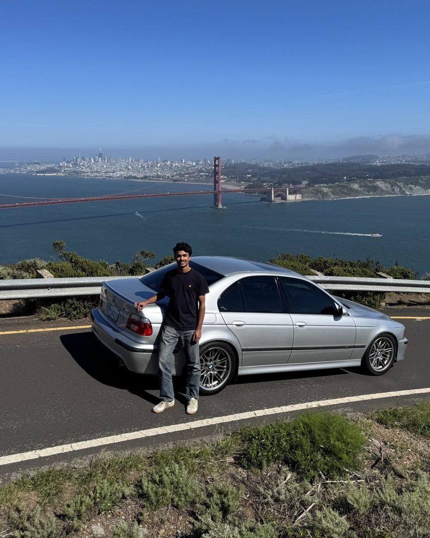 Ishan with his BMW M5 above the Golden Gate Bridge